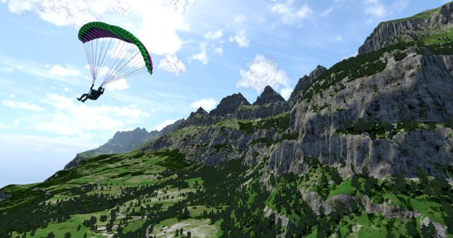 Paraglider soaring along a green mountain ridge